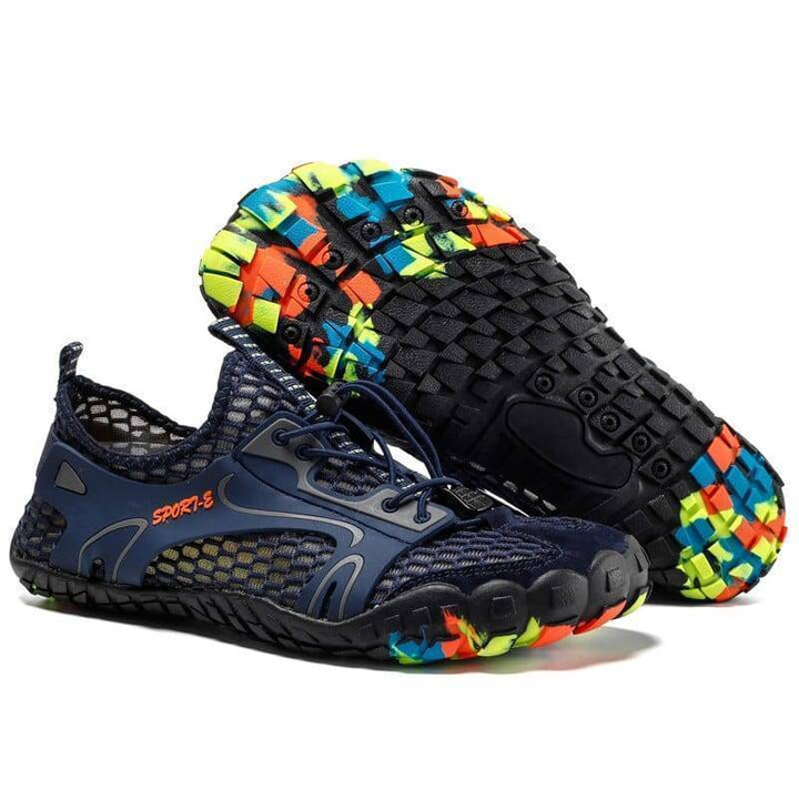 Waterproof men's trekking boots, offering enhanced traction for rugged terrain