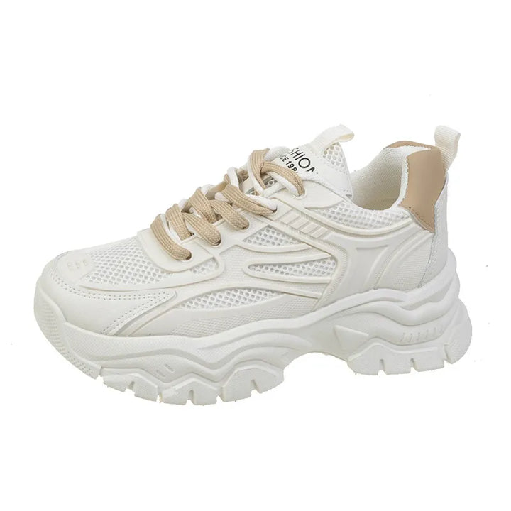 Lightweight women's athletic sneakers with breathable mesh design, perfect for running and training.