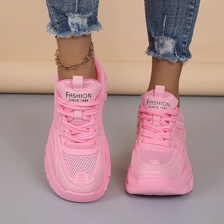 Fashionable chunky platform sneakers for women, offering a stylish look with breathable comfort.