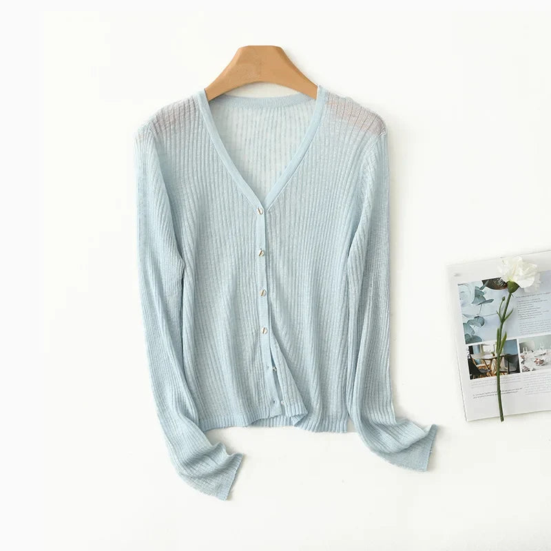 Lightweight women's V-neck cardigan in soft fabric, perfect for effortless layering and casual chic outfits.