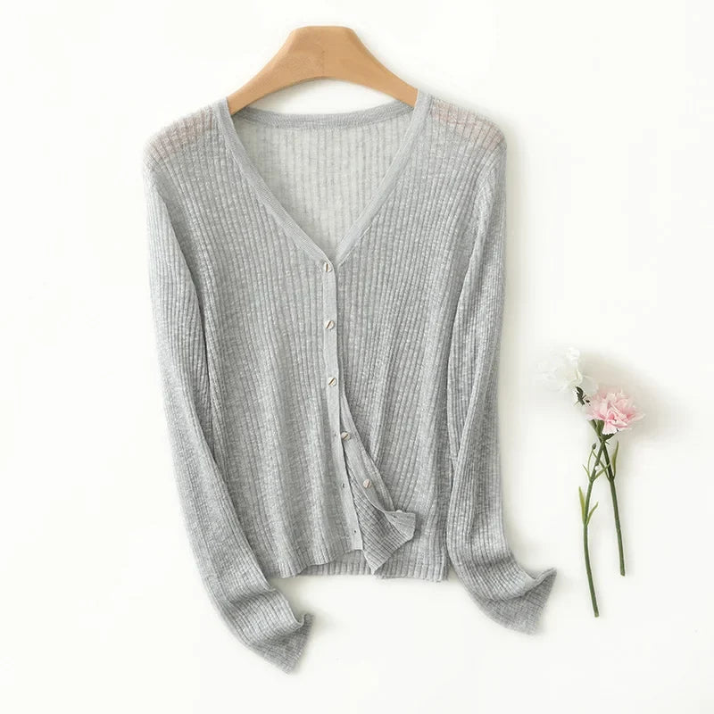 Effortless layering with this women's V-neck cardigan. Lightweight, long sleeve, soft feel for daily fashion.