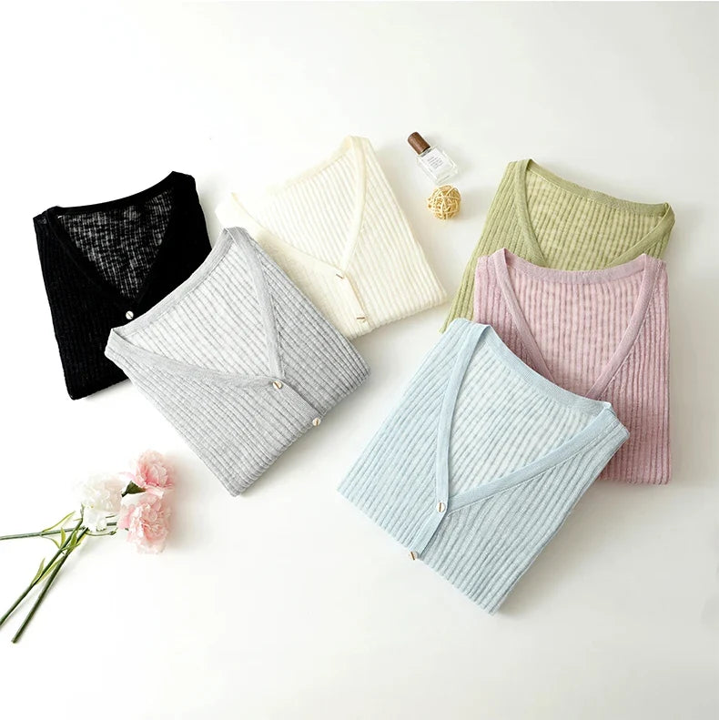 Womenswear: Lightweight V-neck cardigan with long sleeves, soft feel, ideal for versatile casual chic layering.