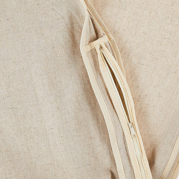Practical zipped garment cover for clothes protection. Dust-proof linen suit & dress bag, perfect for travel & storage.
