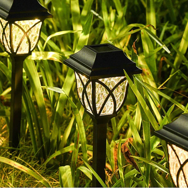 Sustainable LunaGlow solar path lights, waterproof and easy to install for eco-friendly garden & patio decor.