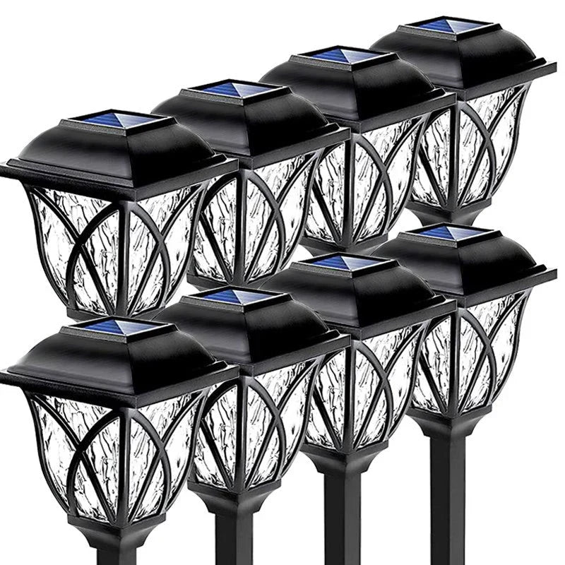 Easy-install LunaGlow solar path lights, stake into the ground for instant, wireless outdoor garden and lawn lighting.