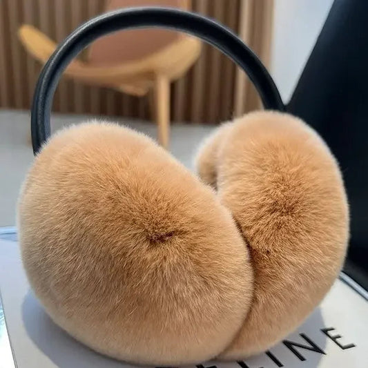 Luxe women's faux fur earmuffs, plush & soft. Perfect winter accessory for warmth & style in cold weather.