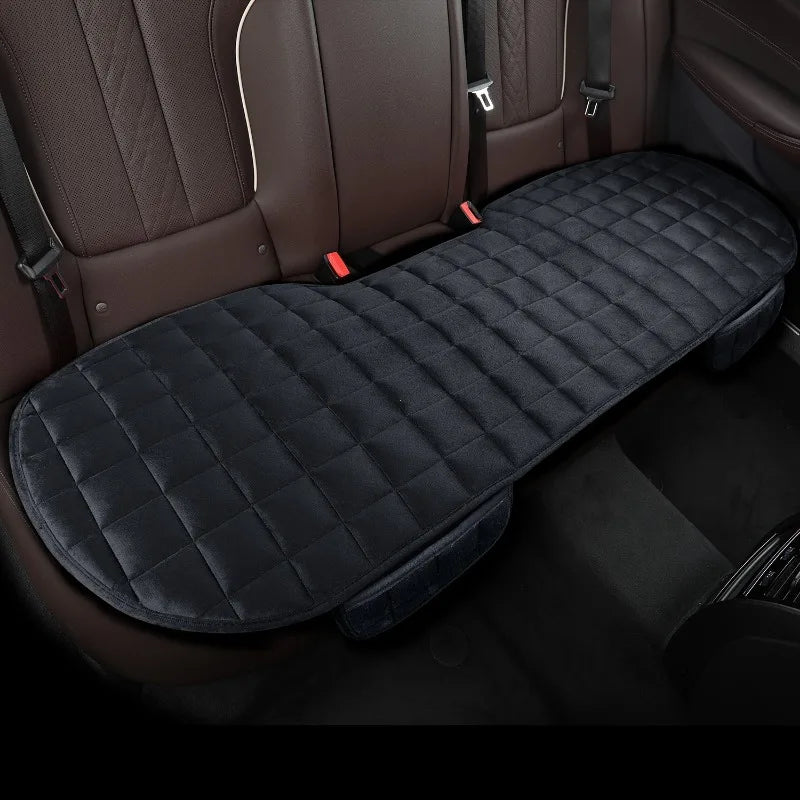 Comfortable car backseat cover for luxury vehicle interior; adds premium seat padding.