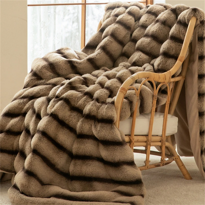 Luxurious faux fur throw blanket, rabbit-soft for ultimate comfort & elegant home decor.
