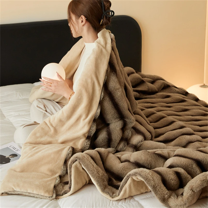 Ultra-soft faux fur throw, a luxurious and cozy addition to your home bedding & living spaces.