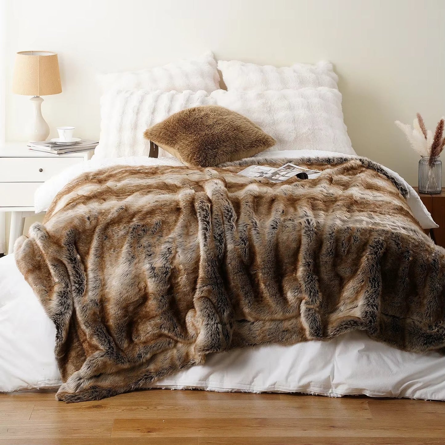 Machine washable faux fur throw blanket, offering luxurious softness and cozy comfort for home relaxation.