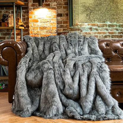 Decorative faux fur throw blanket, soft and luxurious, enhancing any room with cozy, elegant living style.