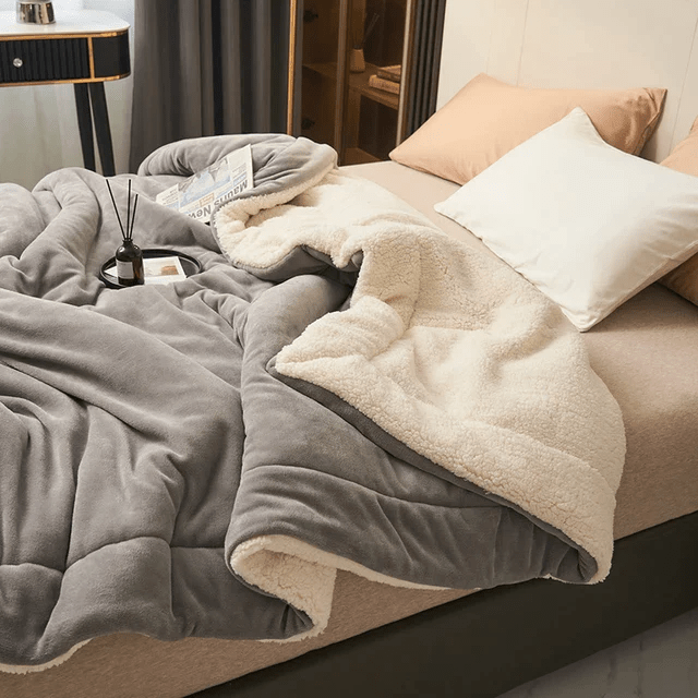Warm throw blanket, super soft machine washable fleece for living room comfort or bedroom luxury.