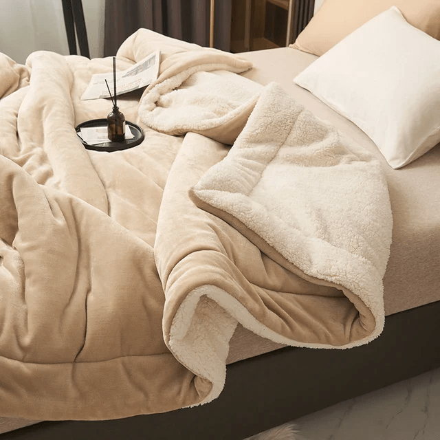 Unisex soft fleece blanket, ideal for ultimate comfort & warmth, a stylish home decor piece.