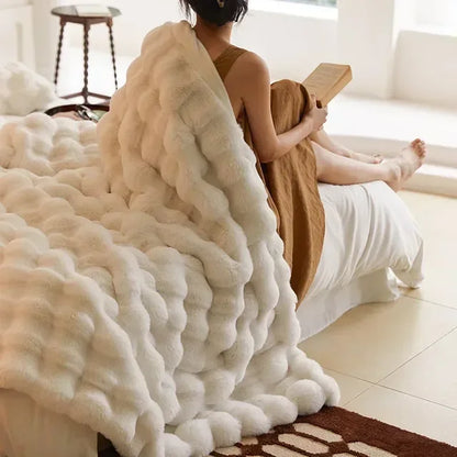 Close-up of soft, fluffy faux fur blanket texture, offering warmth and luxury for home.