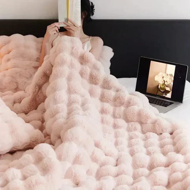 Elegant fluffy faux fur blanket for ultimate warmth & comfort. A luxurious home decor throw.