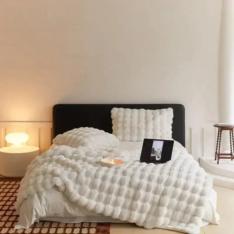 Plush faux fur blanket, super soft and portable. Perfect cozy throw for bed, sofa, or travel.