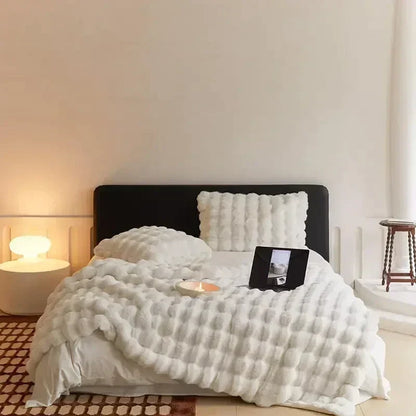 Plush faux fur blanket, super soft and portable. Perfect cozy throw for bed, sofa, or travel.