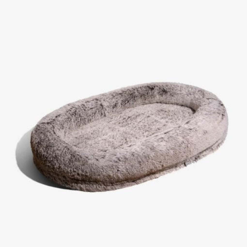 Giant human-sized dog & cat bed offering deep anxiety relief. Super soft faux fur for ultimate comfort and shared lounging.