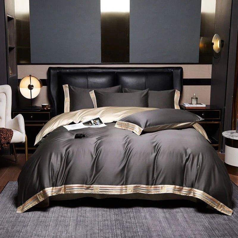 Neatly folded luxurious satin bedding set, ready to transform any bedroom with elegant design & comfort.