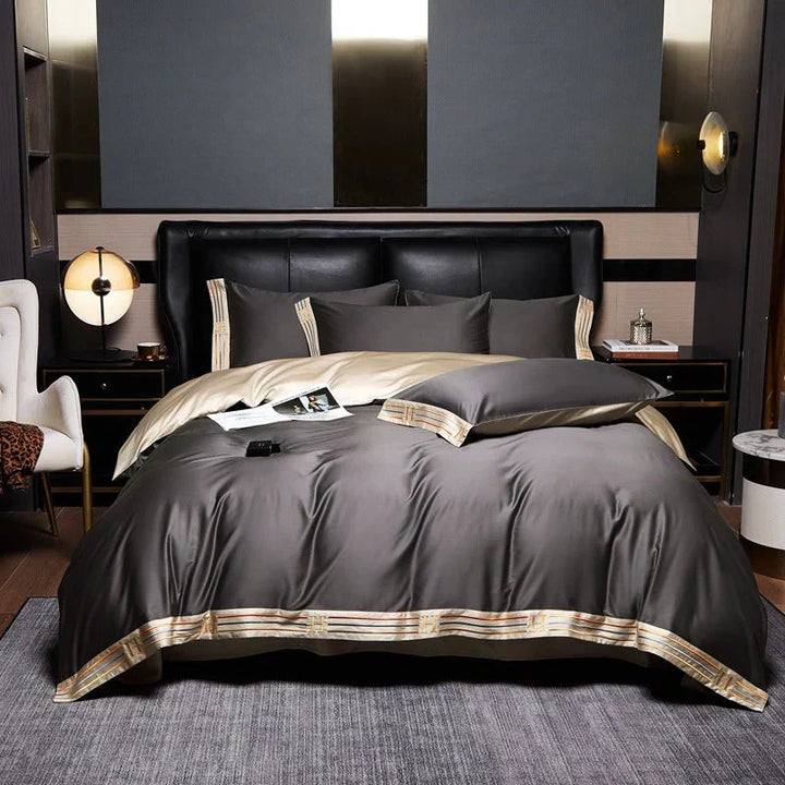 Neatly folded luxurious satin bedding set, ready to transform any bedroom with elegant design & comfort.