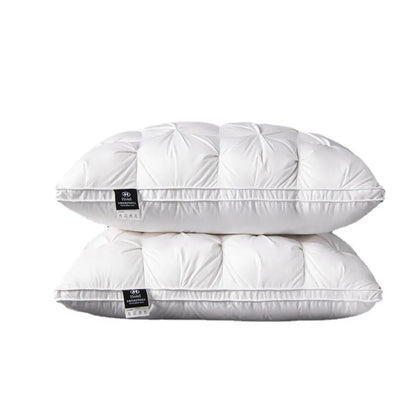 Luxurious white goose down pillow for ultimate sleep comfort & neck support. Soft, breathable cotton bedding.