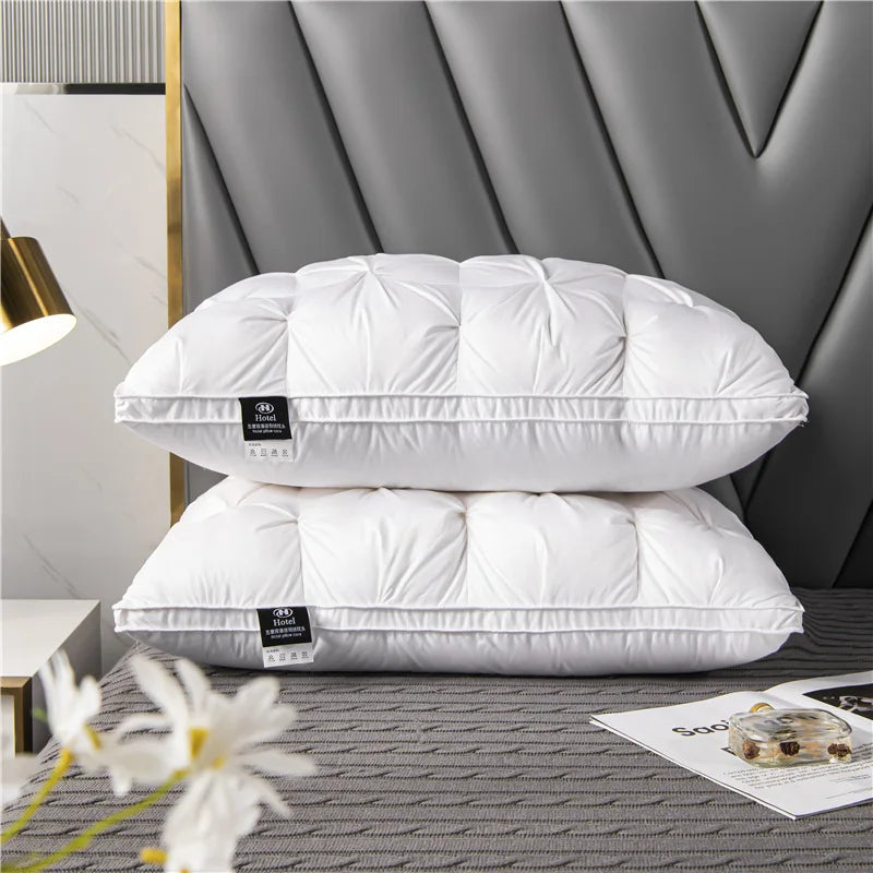 Breathable white goose down pillow, soft & supportive for ultimate sleep comfort. Luxury cotton bedding for home.