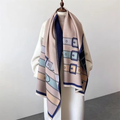 Draped women's patterned cashmere blend scarf, a soft, warm, and luxurious fashion accessory.