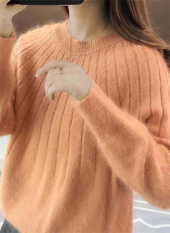 Stylish women's warm knit sweater, a cozy cashmere top. Perfect for luxurious fall & winter fashion.