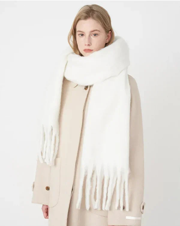 Luxurious women's cashmere scarf, providing superior winter warmth & comfort.