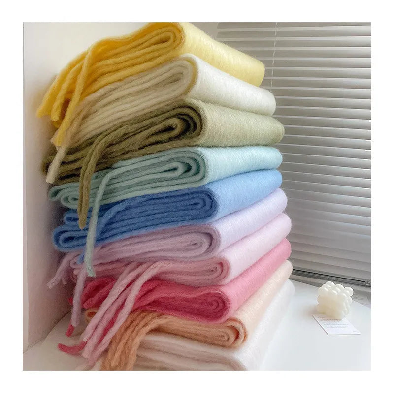 Stylish plain cashmere scarf for women, a chic accessory for cold weather.