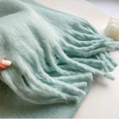Cozy women's cashmere scarf, offering ultimate softness & luxury for winter.