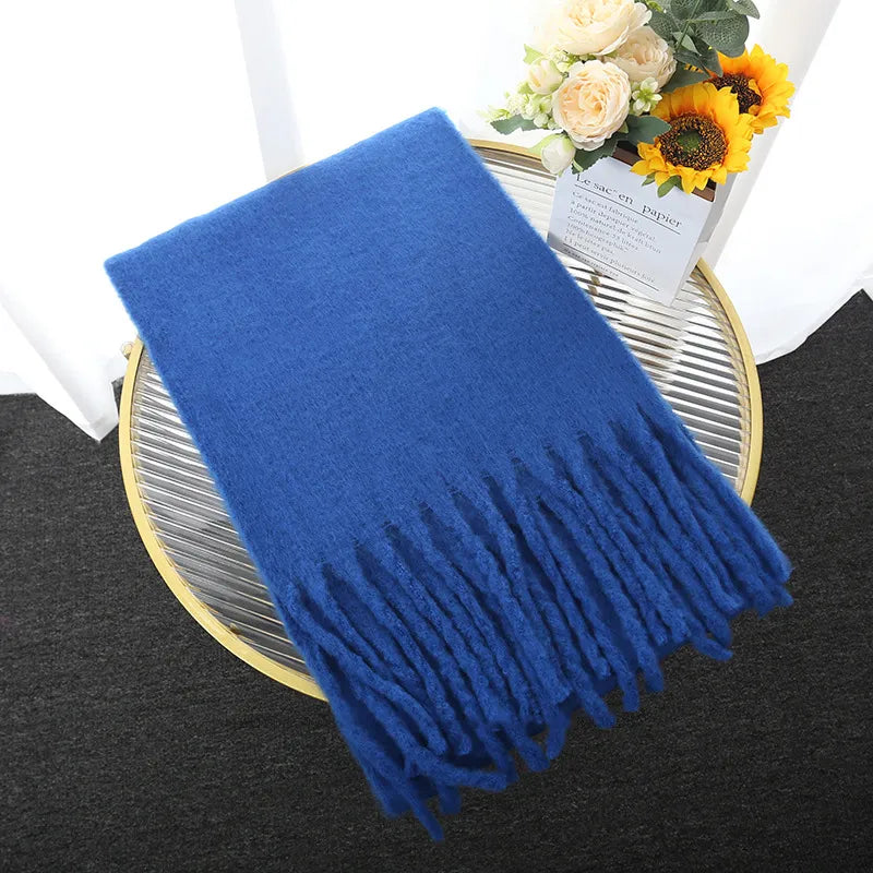 Pure cashmere scarf for women, providing luxurious warmth & softness for winter.