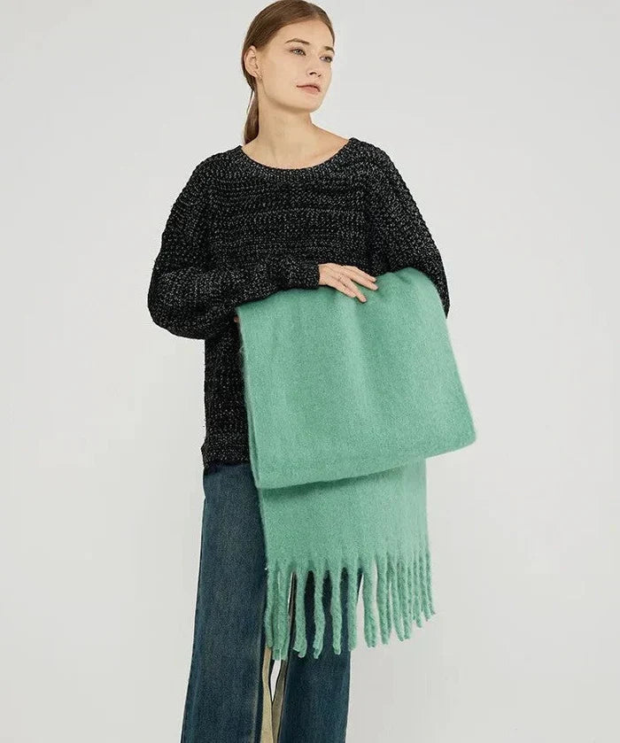 Long plain cashmere scarf for women, perfect for versatile winter fashion.