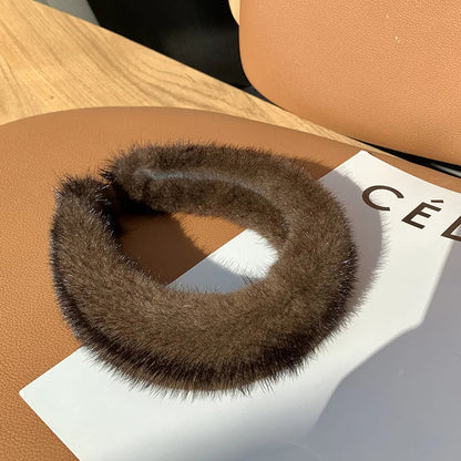 Soft faux fur headband for women, a plush and warm winter fashion accessory.