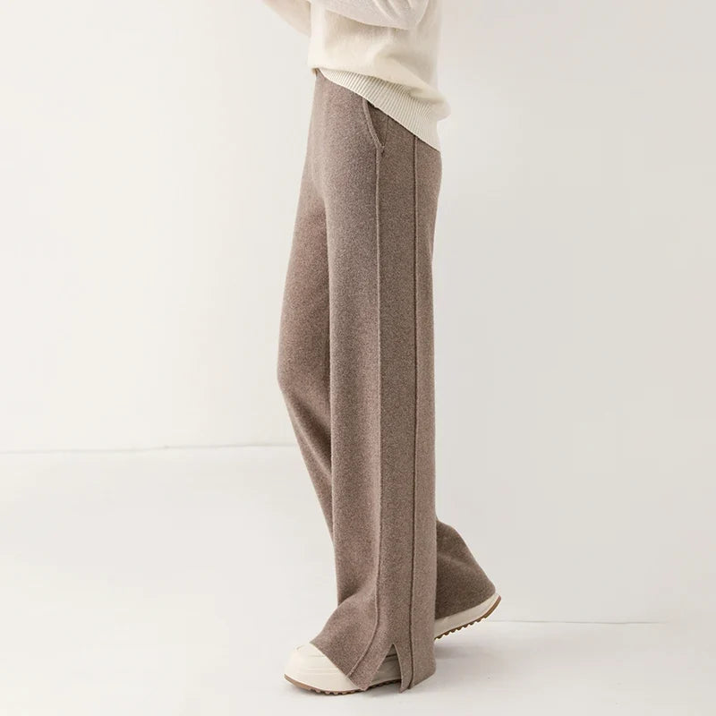 Full-length view of women's luxurious merino wool trousers, showcasing the soft drape and relaxed fit.