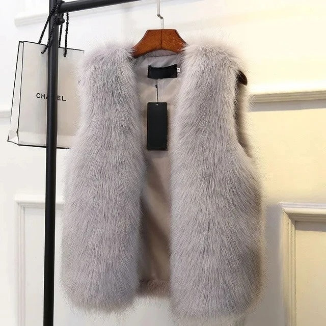 Luxurious women's plush vest for elegant layering. Soft, cozy gilet perfect for fall & winter chic.
