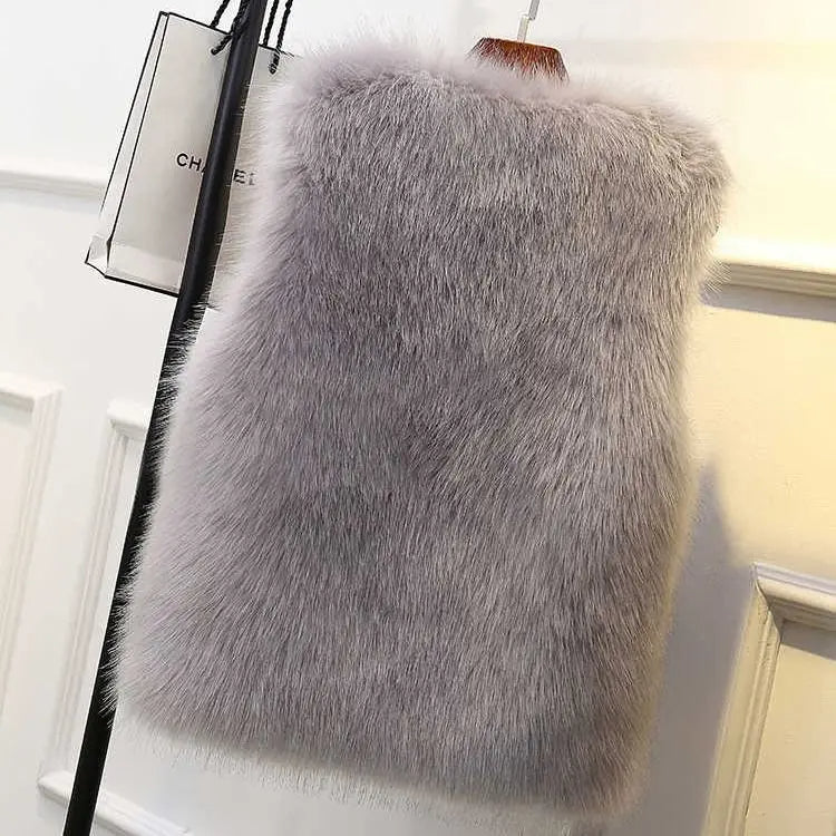 Chic women's plush vest, a stylish sleeveless jacket for warm layering. Elegant outerwear for winter.
