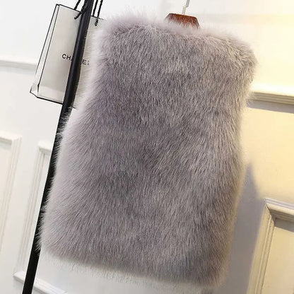 Chic women's plush vest, a stylish sleeveless jacket for warm layering. Elegant outerwear for winter.