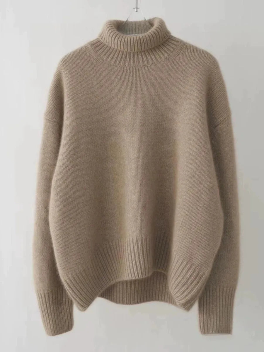 Versatile women's relaxed fit turtleneck sweater. Warm, cozy, and stylish for layering in winter fashion.