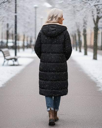 Elegant women's winter coat, long design, combining warmth with fashion.