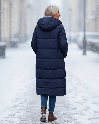 Elegant long women's winter coat, plush and warm for luxurious cold style.