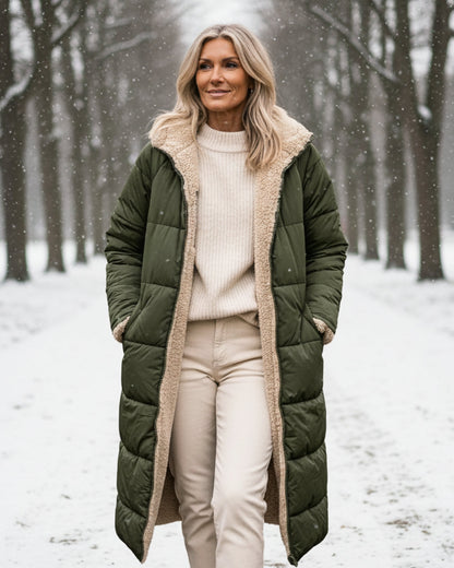 Fashionable women's long winter coat, ideal for elegant cold weather outfits.