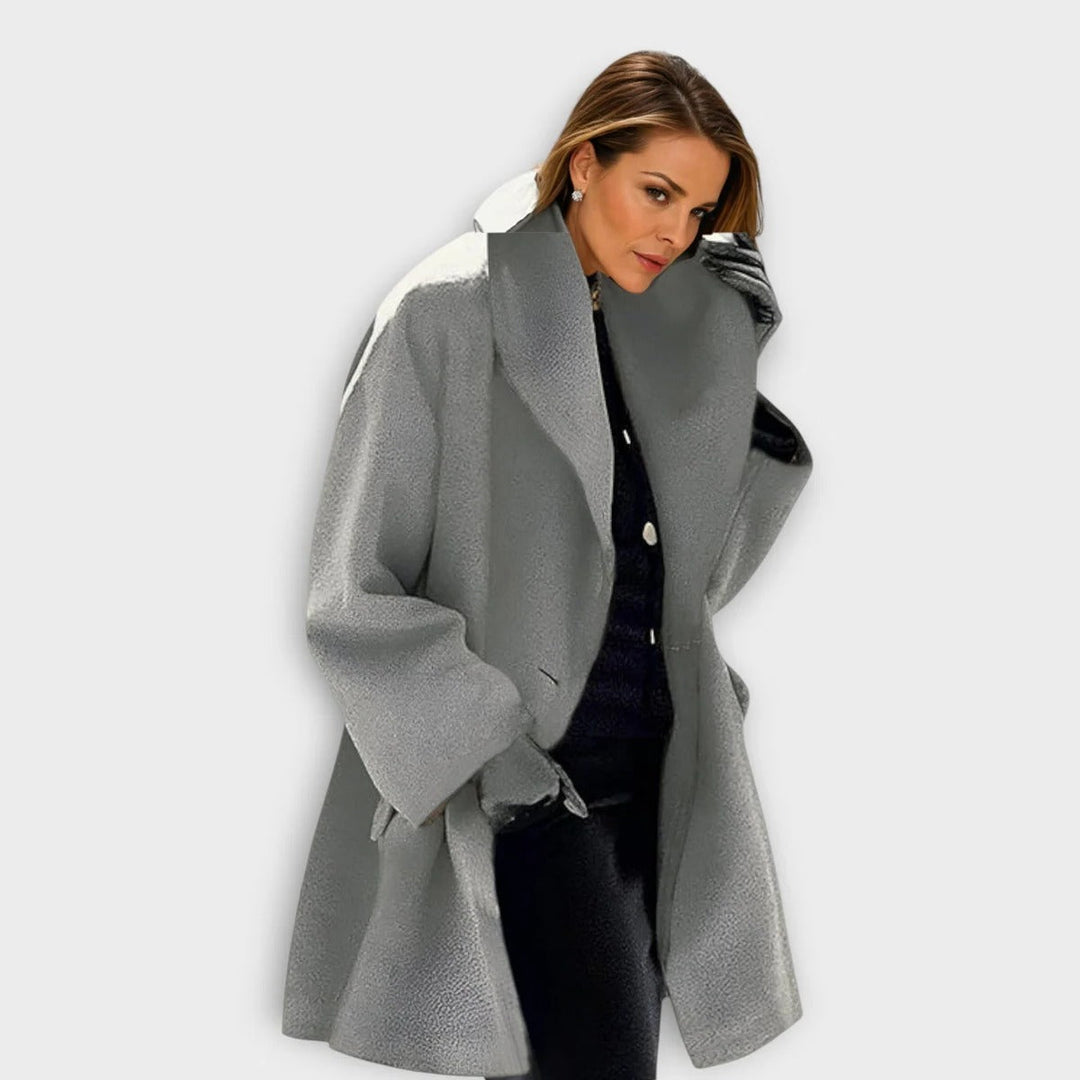 Long women's luxurious windproof wool coat, excellent for cold weather style and warmth.