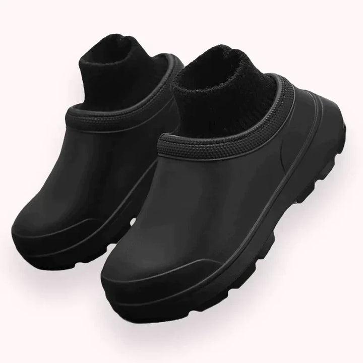 Stylish women's Madeline clogs, easy slip-on design with a soft knit ankle cuff, perfect for casual walks.
