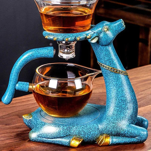 Sleek glass tea set with innovative magnetic design, perfect for modern kitchen decor & brewing loose leaf tea.