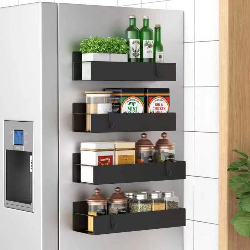 Black powder-coated magnetic spice rack set (4) for stylish kitchen organization & spice storage.