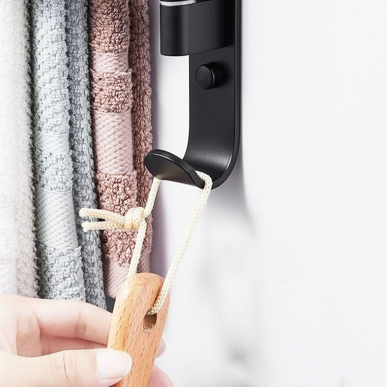 Sleek matte black 5-arm swivel towel bar for modern bathroom decor. Wall-mounted solution for towel storage.