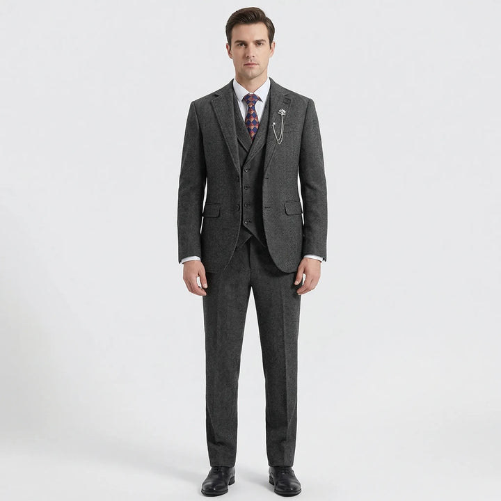 Sophisticated men's tailored herringbone vest suit. Ideal for formal events, business, and wedding guests.