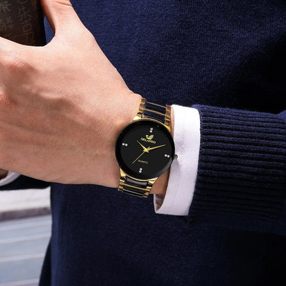 Elegant men's essential accessory gift set for him. Features a watch, wallet, sunglasses, & stylish essentials.