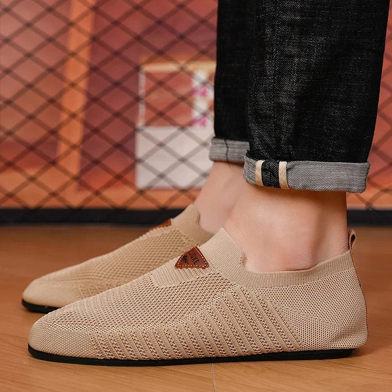 Comfortable men's AirKnit slip-on shoes. Breathable, lightweight casual sneakers for walking.